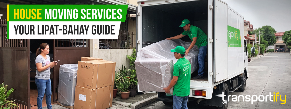 2 personnel loading a couch and appliances into a closed van, doing a house moving