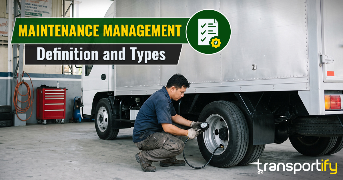 Mechanic checking truck tire pressure for fleet maintenance management.